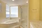 Walk-in Shower and Garden Tub with View